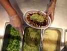 Chipotle to raise wages, pay bonuses in hiring push