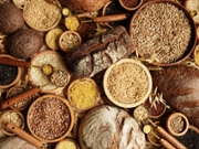 Whole grains concept background. Colorful mix of grain varieties: oat and wheat, rice and millet, buckwheat and barley, quinoa and polenta. Food ingridients for healthy diet. Selective focus