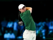 PALM BEACH GARDENS, FLORIDA - MARCH 17: Rory McIlroy of Boston Common Golf plays a shot on the first hole during a match against Jupiter Links GC at SoFi Center on March 17, 2026 in Palm Beach Gardens, Florida. (Photo by James Gilbert/TGL/TGL Golf via Getty Images)