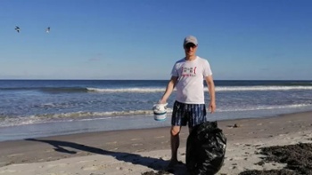 This astronaut is spending his SpaceX launch delay cleaning up a Florida beach