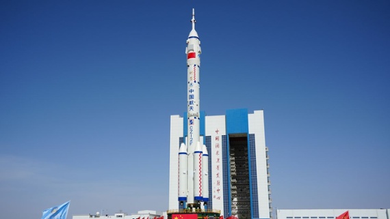 China rolls out rocket for next astronaut mission