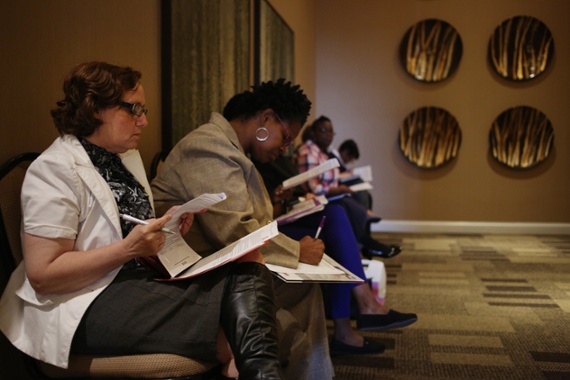 Initial jobless claims fall to four-week low of 202K