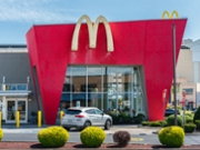 Atlantic City, NJ - Aug 28, 2025: Close-up evening view of McDonald's restaurant, founded in 1940, is one of the world's largest fast-food chains, with more than 39,000 locations globally