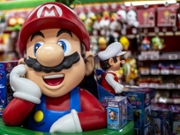 Nintendo characters Mario are displayed in the gaming section for Nintendo products at a shop in Tokyo on May 7, 2026. (Photo by Philip FONG / AFP via Getty Images)