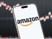 SHENZHEN, CHINA - JULY 23: In this photo illustration, a smartphone displays the logo of Amazon.com Inc. (NASDAQ: AMZN), an American multinational technology company specializing in e-commerce, cloud computing, digital streaming and artificial intelligence services, in front of a screen showing the company's latest stock market chart on July 23, 2026 in Shenzhen, Guangdong Province, China. (Photo illustration by Cheng Xin/Getty Images)