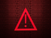 A vivid red warning triangle sits over a dense field of binary digits, conveying cybersecurity vigilance, hacking risks, and digital threat awareness in a bold, modern visual.