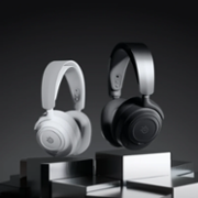 White & black steel series headsets hovering above plinths
