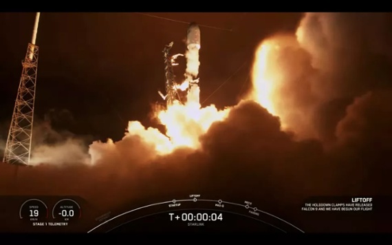 SpaceX Falcon 9 rocket launches record 12th mission, lands at sea