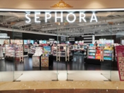 CHANGZHOU, JIANGSU, CHINA - 2026/05/05: The interior of a Sephora beauty store at Jiangnan Global Harbor is shown through glass windows, with rows of beauty product displays, brand signs, and shoppers browsing. (Photo by Sheldon Cooper/SOPA Images/LightRocket via Getty Images)