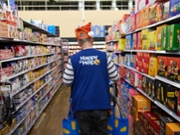 A worker fulfills online pickup orders at a Walmart store on Black Friday in Columbus, Ohio, US, on Friday, Nov. 28, 2025. US consumers are heading into the official start of the holiday shopping season Friday with a host of economic concerns, including a cooling job market, stagnant wages, persistent inflation and the looming fallout from tariffs. Photographer: Brian Kaiser/Bloomberg via Getty Images