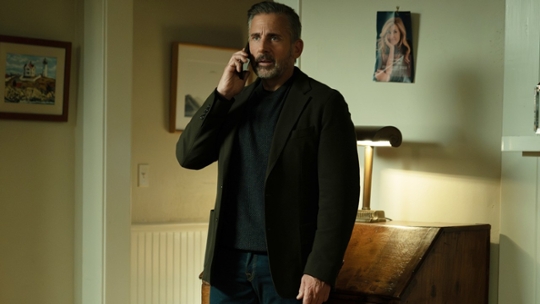 Greg getting some news on the phone.