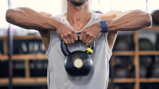 Ditch the gym — use this 15-minute kettlebell home workout to build strength and boost your metabolism