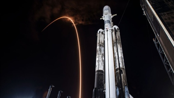 Falcon 9 soars over Falcon Heavy in launch photo