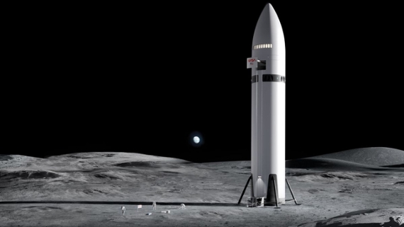 a white rocket on a dusty grey surface