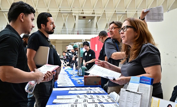 US job openings fall to two-year low 8.7M in Oct.