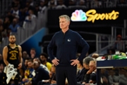 SAN FRANCISCO, CALIFORNIA - APRIL 09: Head coach Steve Kerr of the Golden State Warriors stands in front of the NBC Sports logo against the San Antonio Spurs in the second quarter at Chase Center on April 09, 2025 in San Francisco, California. NOTE TO USER: User expressly acknowledges and agrees that, by downloading and or using this photograph, User is consenting to the terms and conditions of the Getty Images License Agreement. (Photo by Eakin Howard/Getty Images)