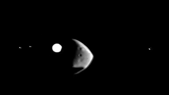 Mars moon blocks out mighty Jupiter in rare satellite view (video)
