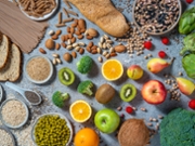 High content of dietary fiber food, rich fiber sources vegan food arrangement including fruits and vegetables, seeds beans, whole grain carbohydrates, nuts and legumes ingredients.