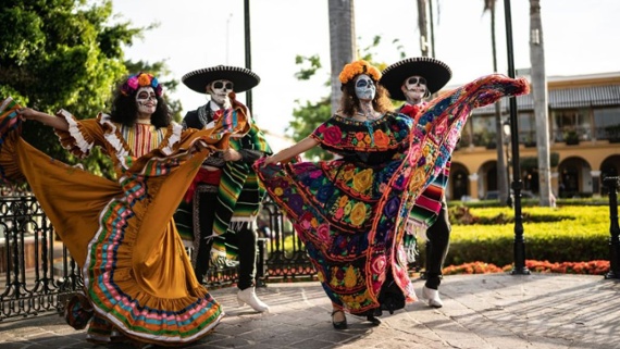 The Day of the Dead isn't Halloween. Here are its roots, from Aztec goddess worship to modern Mexican celebration