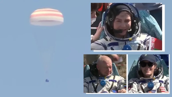 Soyuz capsule with crew of lands safely