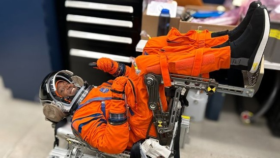 Artemis backup astronaut Andre Douglas tries on sapcesuit