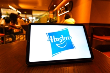 CHINA - 2025/09/27: In this photo illustration, the Hasbro logo is seen displayed on the screen of the tablet. (Photo Illustration by Sheldon Cooper/SOPA Images/LightRocket via Getty Images)