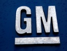 GM plans restructuring, mass layoff