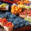 Fresh fruits, berries and vegetables on the market stall a farmer's market