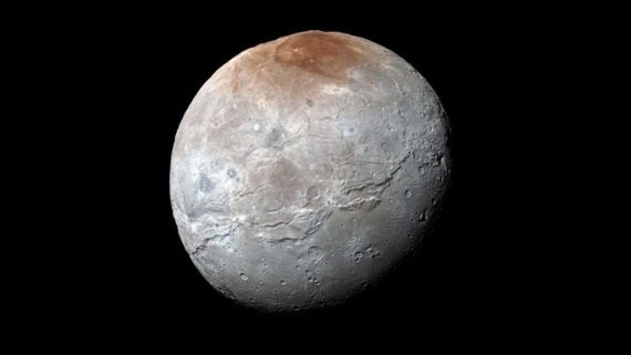 Pluto's moon Charon sports a red polar cap that forms as seasons change