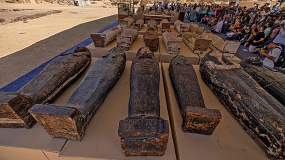 Hundreds of ancient Egyptian sarcophagi, cat mummies and gold-leafed statues unearthed at necropolis