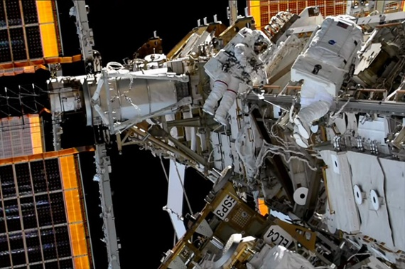 Astronauts install stubborn strut outside space station