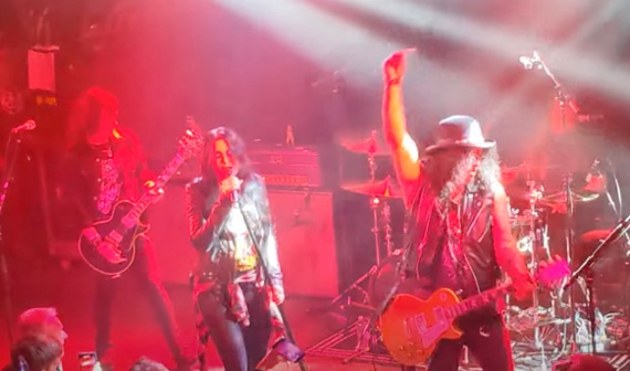 Watch Slash get his Jimmy Page on in a fiery onstage guest spot with hard-rockers Dorothy