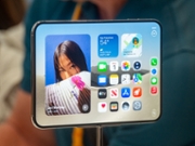 The new foldable iPhone Duo is displayed during an Apple event at the Steve Jobs Theater in Apple Park in Cupertino, California, on September 9, 2026. Apple unveiled its long-awaited first foldable smartphone, the iPhone Duo, on Wednesday, at the company's first launch event since CEO John Ternus took the reins on September 1. Apple's first foldable comes seven years after Samsung pioneered the category, but the American tech giant is expected to take a sizable chunk of the market. (Photo by Karl Mondon / AFP via Getty Images)
