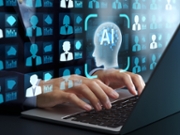 HR manager using candidate assessment and sourcing tool on laptop PC.