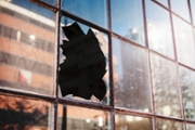 Close-up of a broken window pane.