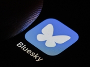 BERLIN, GERMANY - JANUARY 28: In this photo illustration the logo of the social media platform Bluesky (Bsky) can be seen on a smartphone on January 28, 2025 in Berlin, Germany. (Photo Illustration by Thomas Trutschel/Photothek via Getty Images)