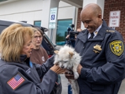 Central Islip, N.Y.: Suffolk County Sheriff Dr. Errol Toulon, Jr. holding a dog with Town of Islip supervisor Angie Carpenter after holding a press conference announcing Suffolk County's first ever Lost Pet Network at the Town of Islip Animal Shelter in Central Islip, New York on May 3, 2022. (Photo by J. Conrad Williams Jr./Newsday RM via Getty Images)
