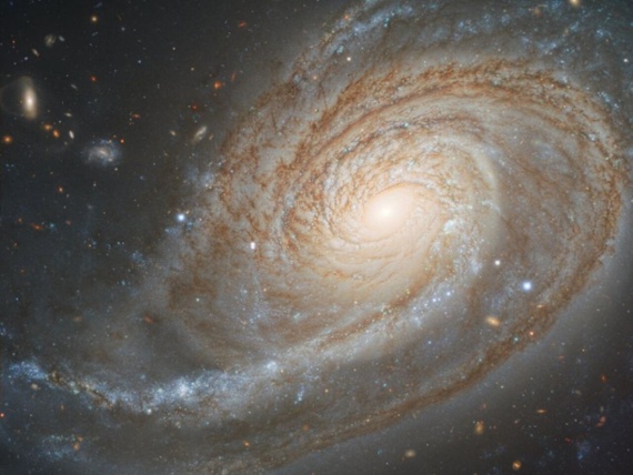 This lopsided galaxy has one seriously pumped-up arm