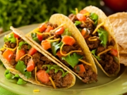 Homemade Ground Beef Tacos with Lettuce, Tomato, and Cheese