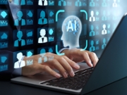 HR manager using candidate assessment and sourcing tool on laptop PC.
