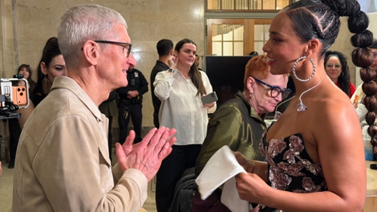 Tim Cook and Alicia Keys at Grand Central Station in NYC to celebrate Apple's 50th anniversary